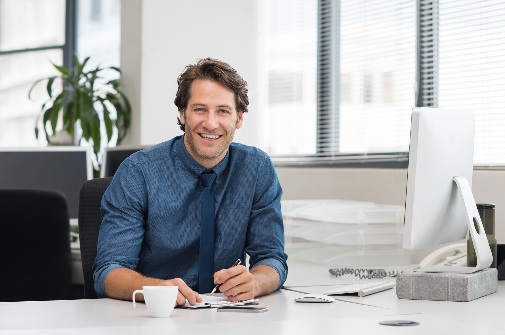 Businessman at His Desk