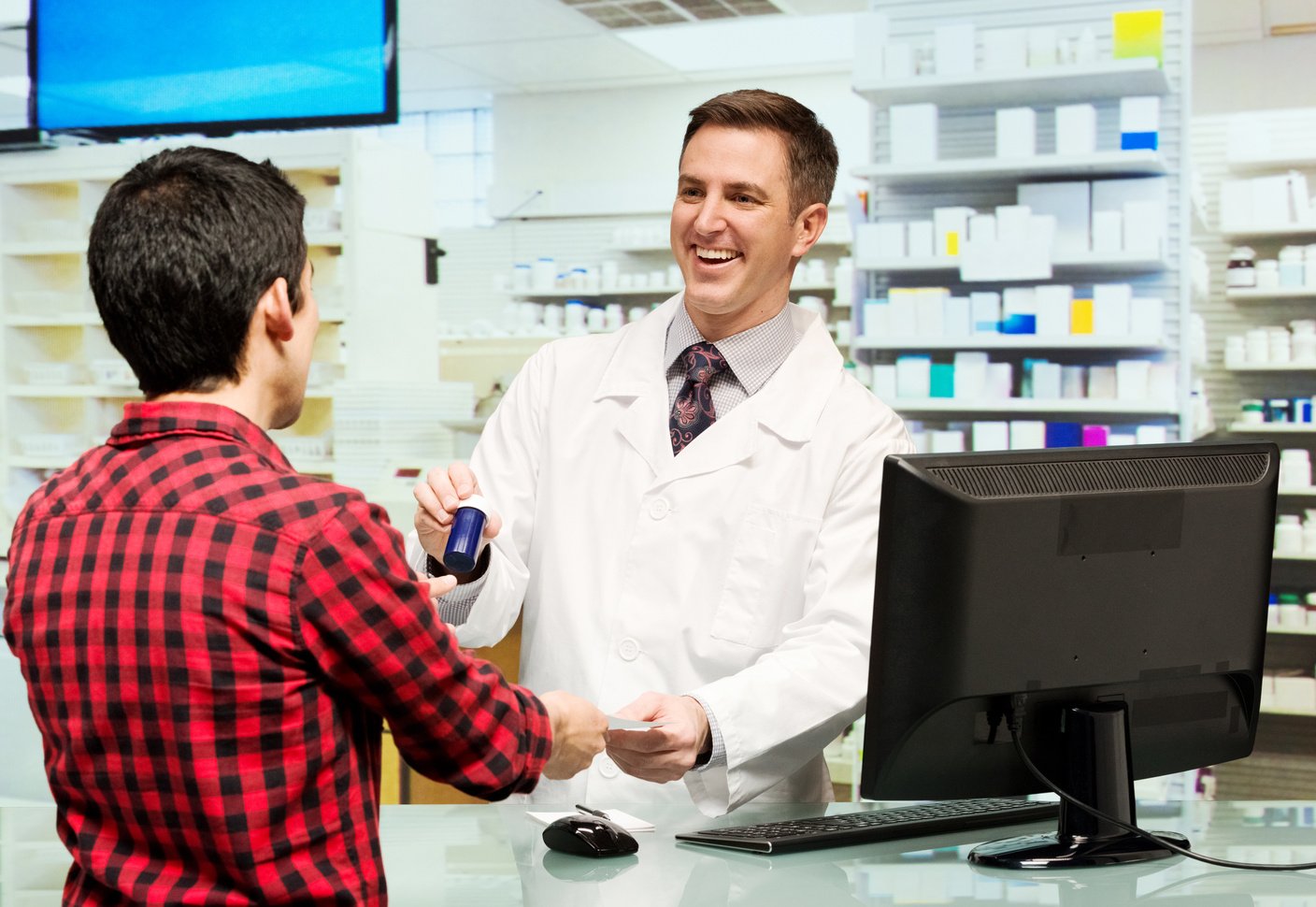 Customer at the drug store and taking service